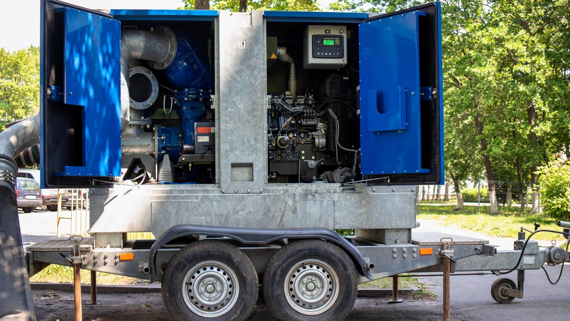 Professional water extraction equipment in use during a Bellevue home restoration - industrial pumps and hoses removing standing water
